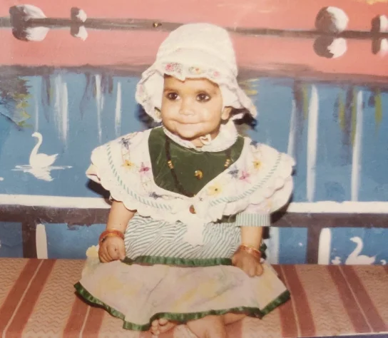 Komal as a child in India