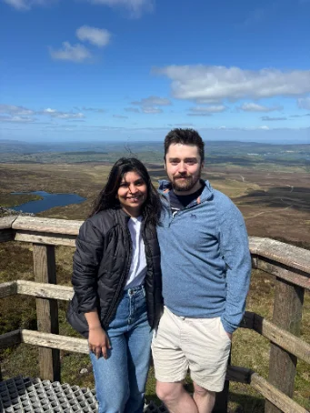 Dan and Komal on a mountain trail
